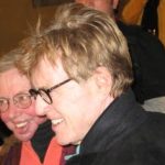 Redford (r), mensch, plunges into crowd to embrace Roger Ebert(l)